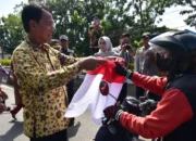 OKI Bagikan 1.500 Bendera Merah Putih Gratis, Kobarkan Semangat Nasionalisme