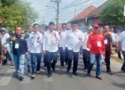 Pasangan JADI Daftar ke KPU OKI dengan Arak-arakan Meriah, Diiringi Musik Tanjidor dan Atraksi Silat