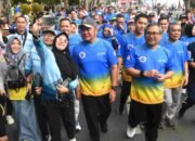 Sinergi Alumni dan Pemerintah: IKA UII Gelar Jalan Sehat dan Bakti Sosial di Palembang