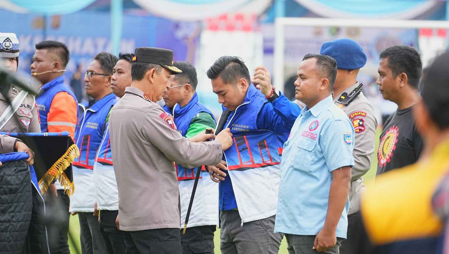 Nyago Bumi Sriwijaya: Ribuan Ojek Online dan Buruh Jadi "Mata" Polri di Jalanan