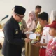 Untuk Pertama Kalinya, Bupati Teddy Meilwansyah Serahkan Beasiswa bagi Siswa Berprestasi Nonakademik di OKU