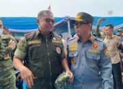 Hadiri Apel Akbar di Jakabaring, Pemkab OKU Berkomitmen Perkuat Kemampuan dan Kesejahteraan Satlinmas