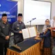 Lantik Nilawati Sebagai Dirut BPR Baturaja Bupati OKU Tekankan Inovasi dan Penguatan UMKM